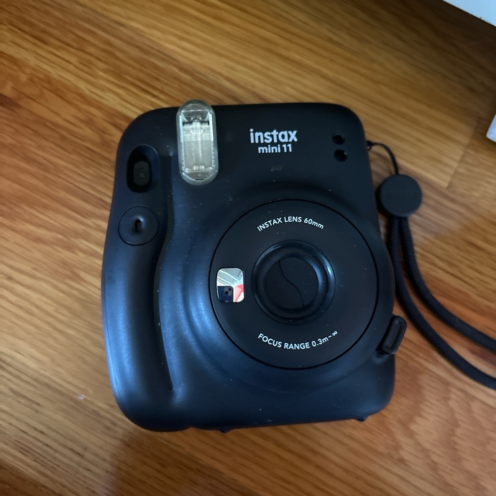 Polaroid Camera + 3 film frames